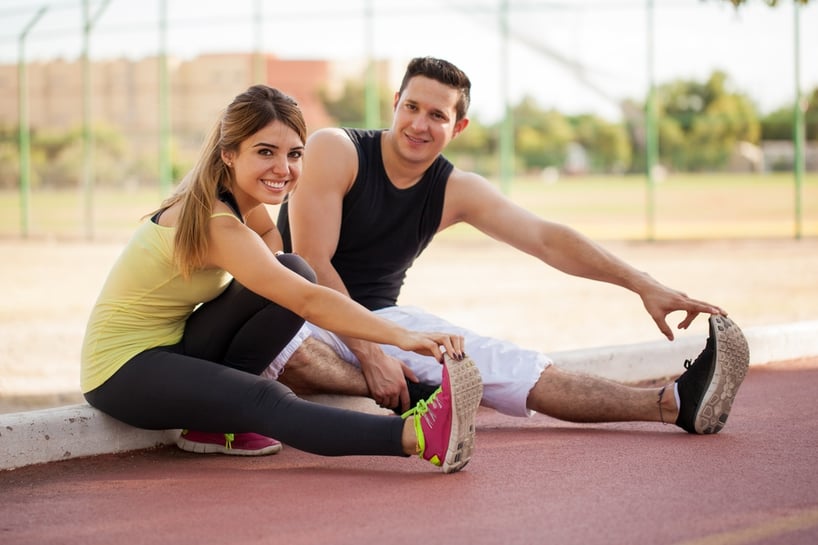 stretches-before-road-race-couple