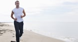 man-Running-on-beach-Corpus-Christi-CorpusChristi